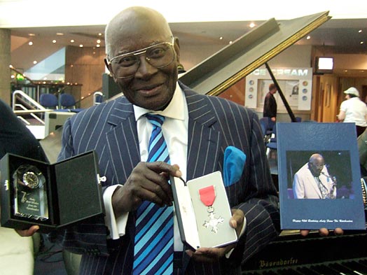 Andy Hamilton with his MBE